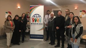 Photographie de groupe des membres du conseil d'administration de l'Association régionale multiculturelle de Miramichi.